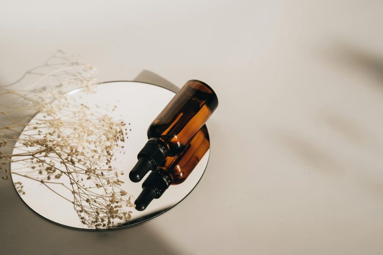 Comment utiliser l’huile essentielle de — bouteille d'huile essentielle de néroli fleurs